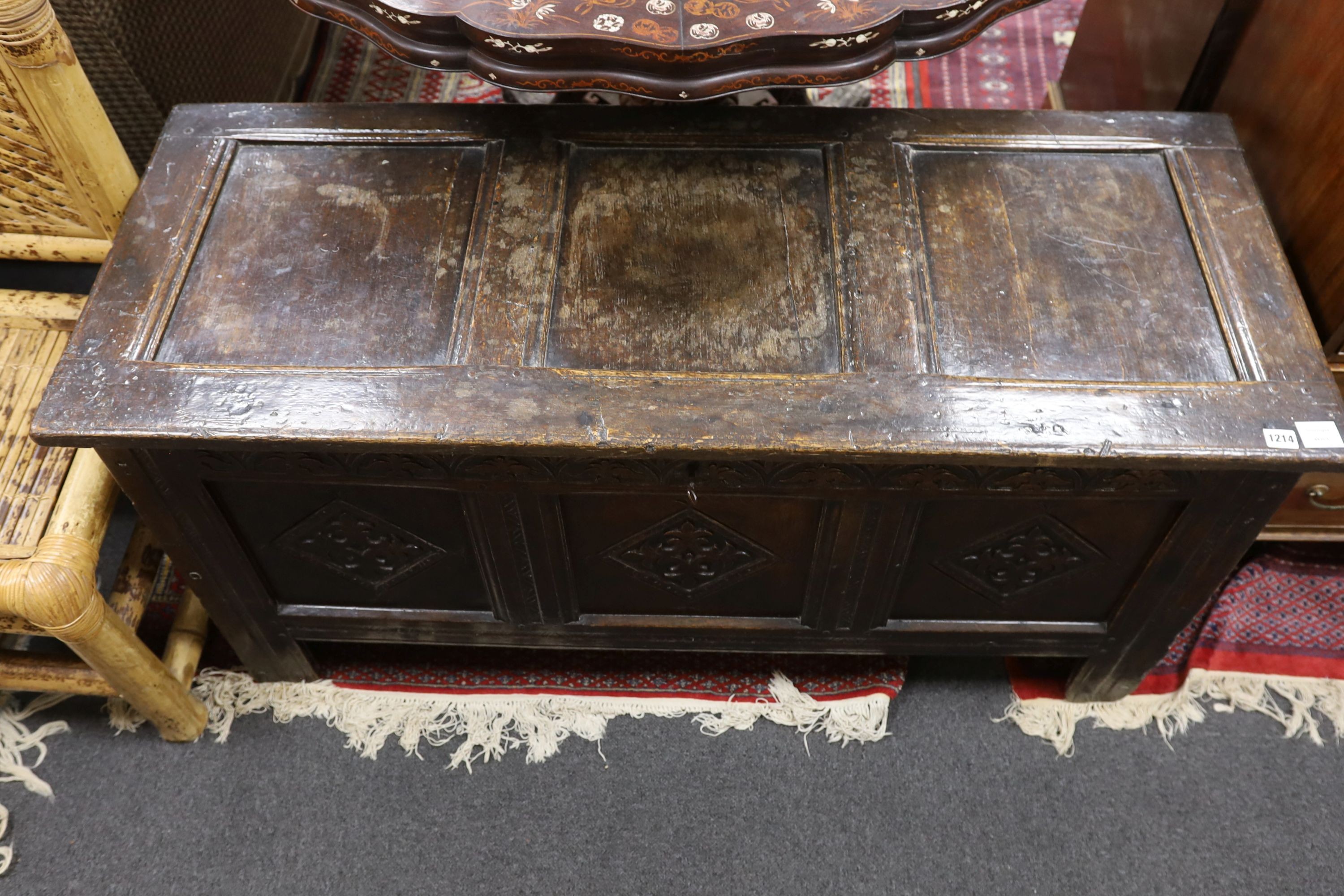 A late 17th century carved oak coffer, length 134cm, depth 54cm, height 68cm